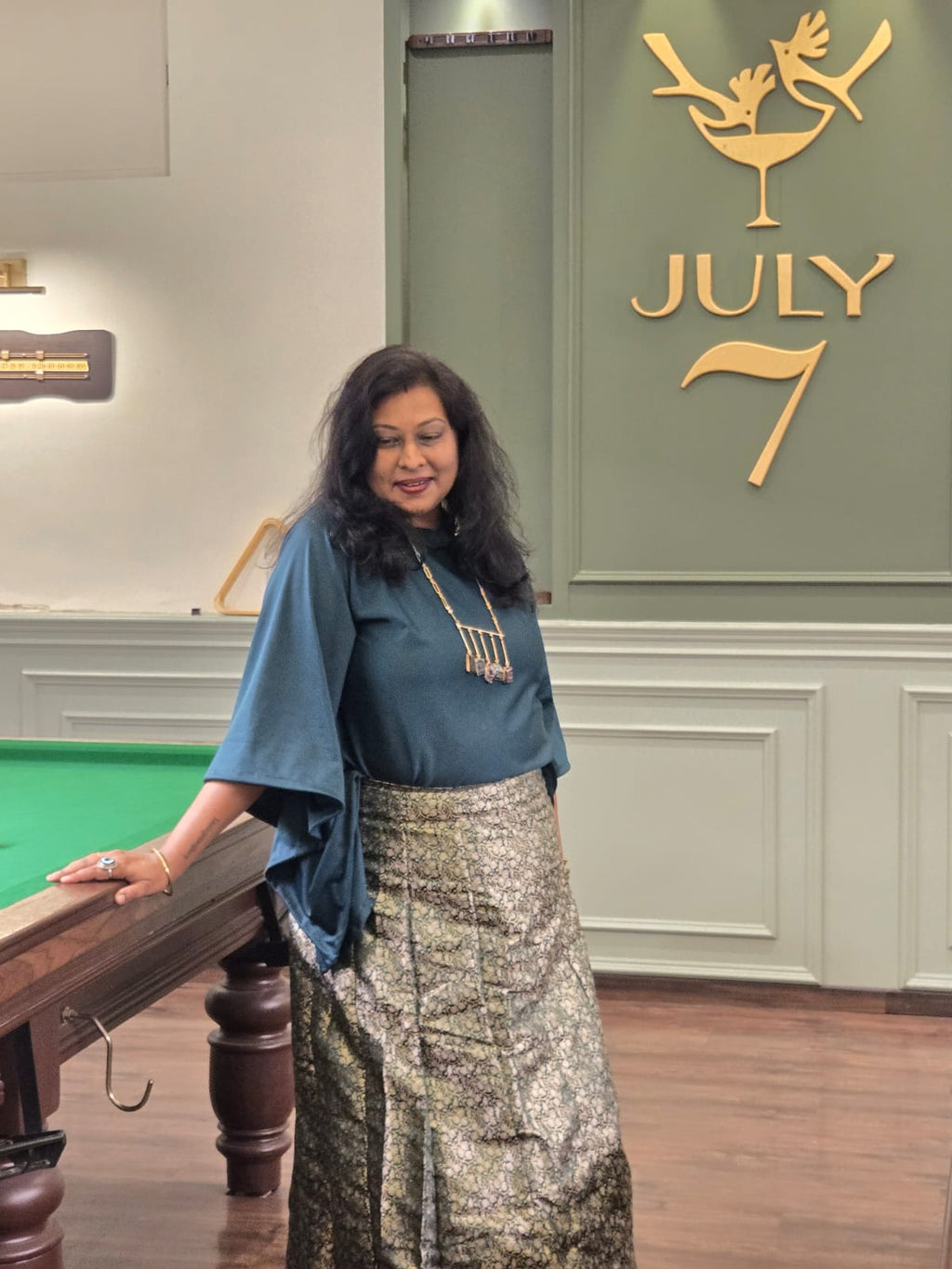 Black And Green Knit Top & Regal Gold Brocade Lehenga Skirt